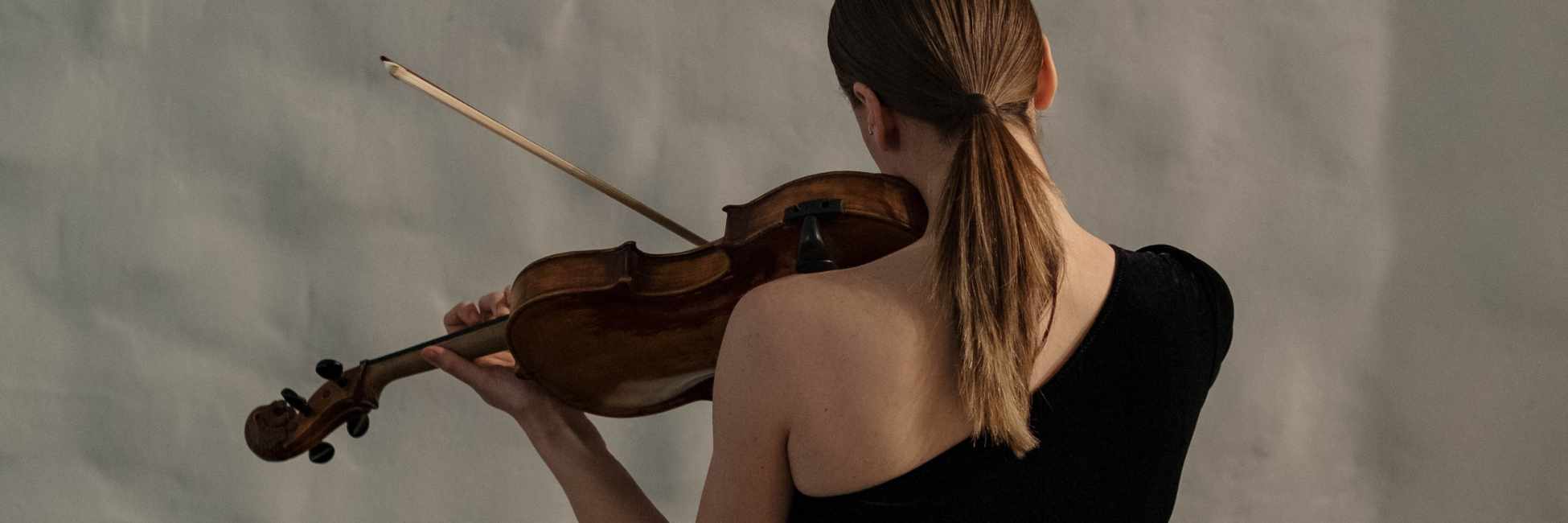Orchestral string instruments including violins and cellos for students and professional musicians at Son of Drum Australia.