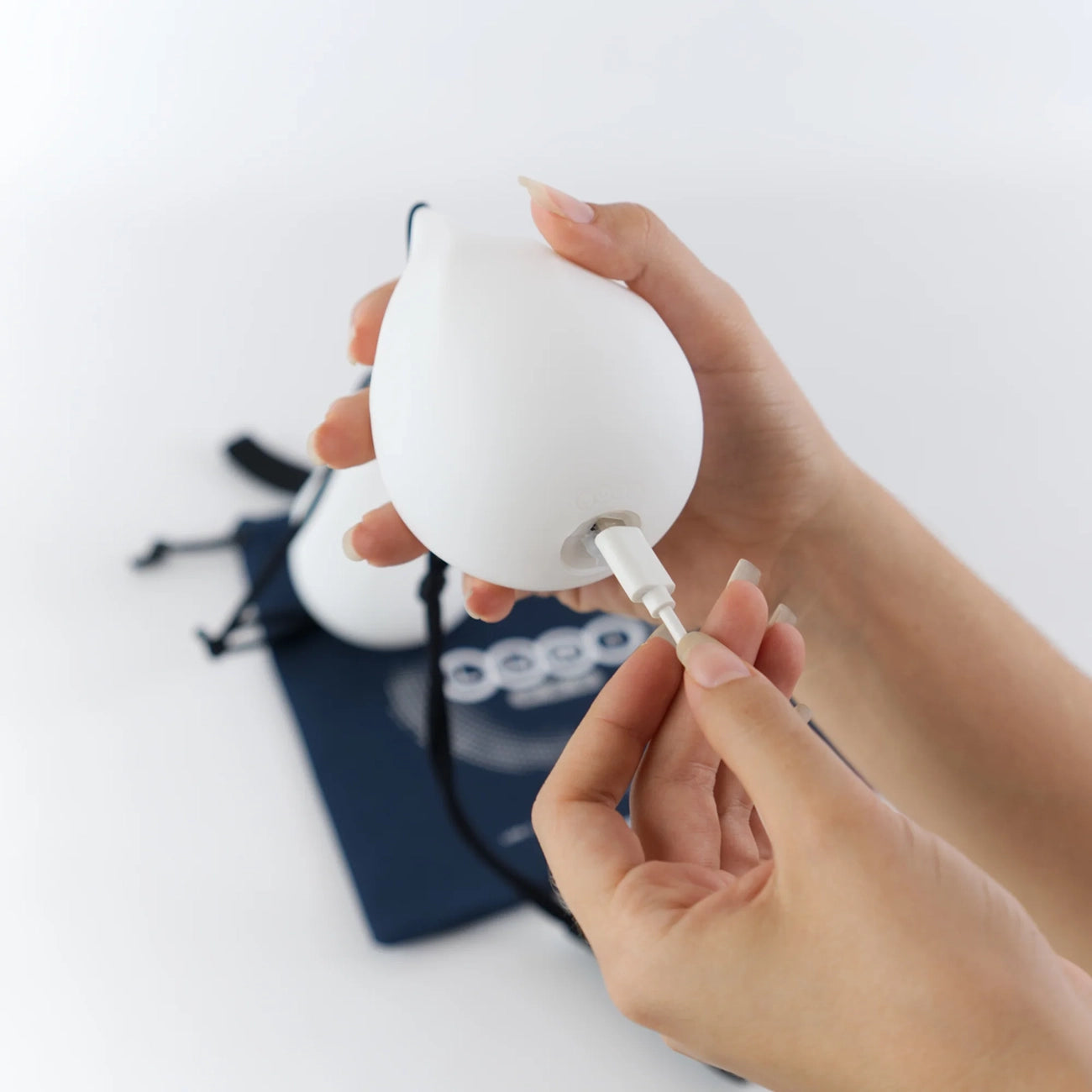 Lumi PRO Rechargable LED Glow Poi Balls - Droplet Shape charging